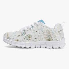 Girls’ Santorini Travel Sneakers with floral design and white base, perfect for outdoor adventures.
