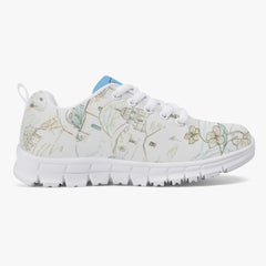 Girls’ Santorini Travel Sneakers in white with floral design, perfect for comfort and style during travel adventures.